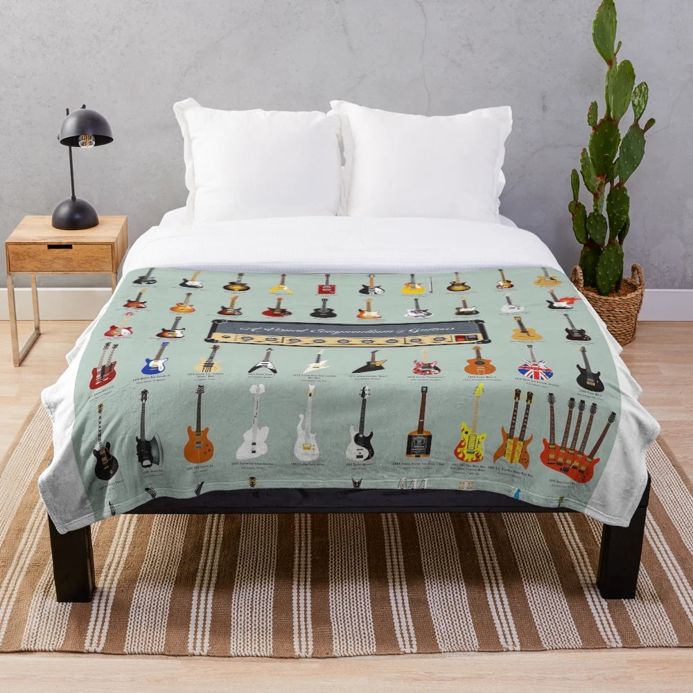 A plush blanket featuring various types of guitars, perfect for music lovers.