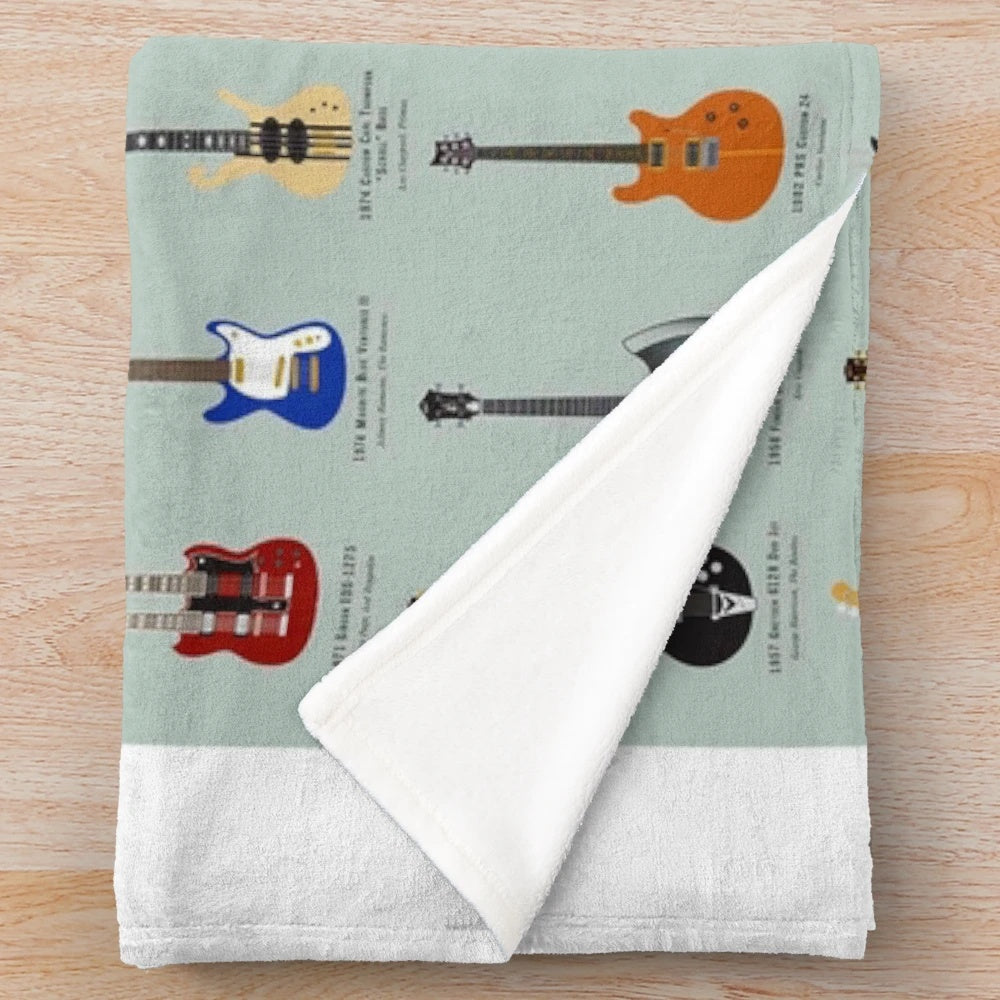A plush blanket featuring various types of guitars, perfect for music lovers.