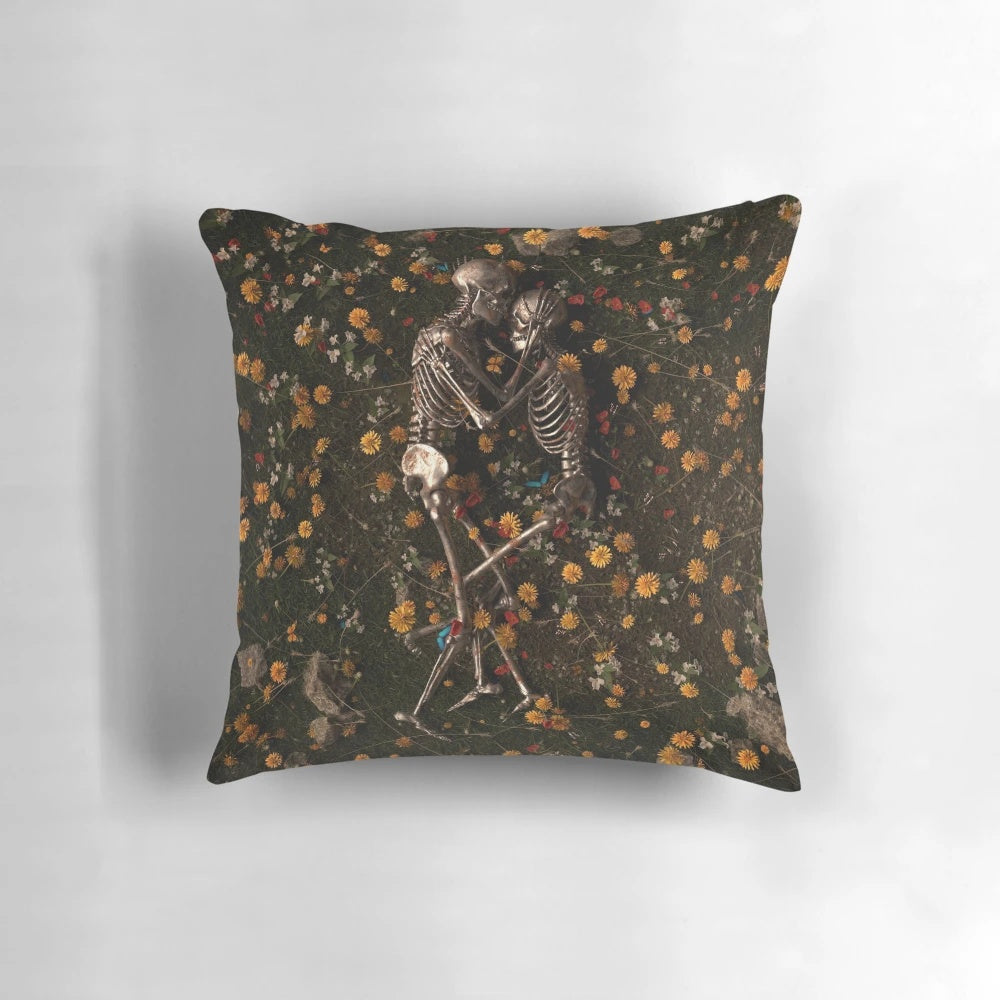 Memento Mori-themed decorative pillow featuring a skull, skeleton, and floral elements
