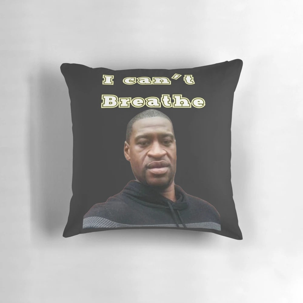 Memorial pillow featuring the words "Breathe" in a yellow color, honoring George Floyd.