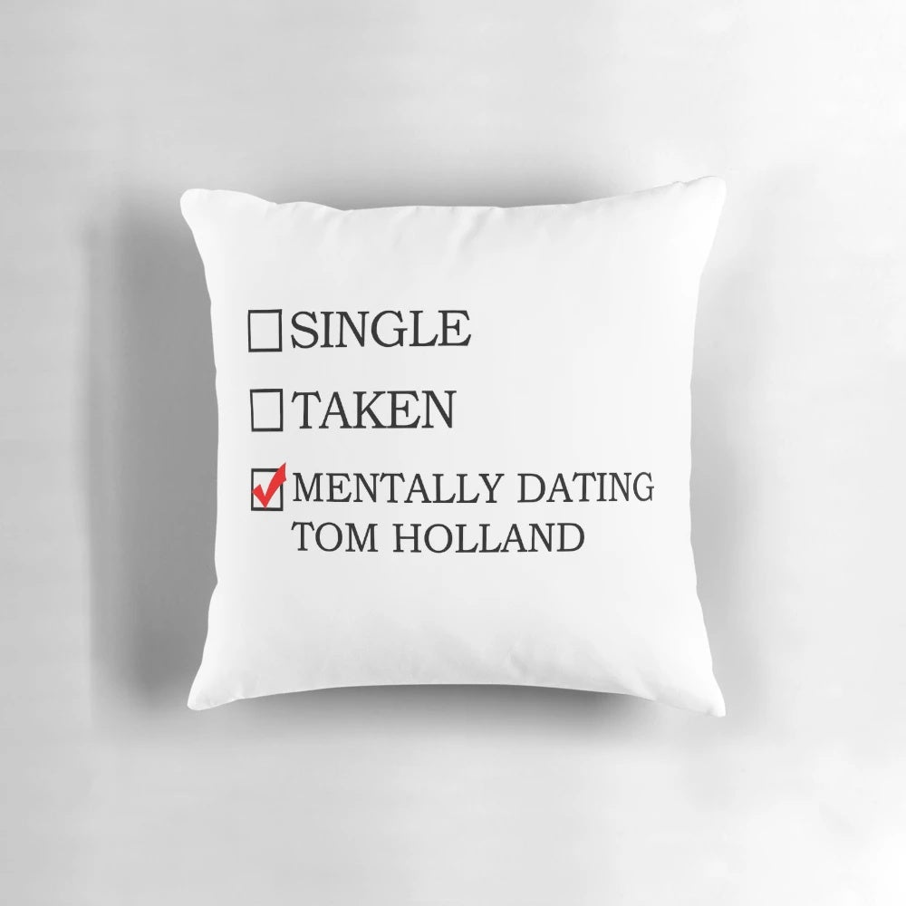 A plush pillow featuring an image of Tom Holland as Spider-Man, perfect for fans of the mentally dating trend.