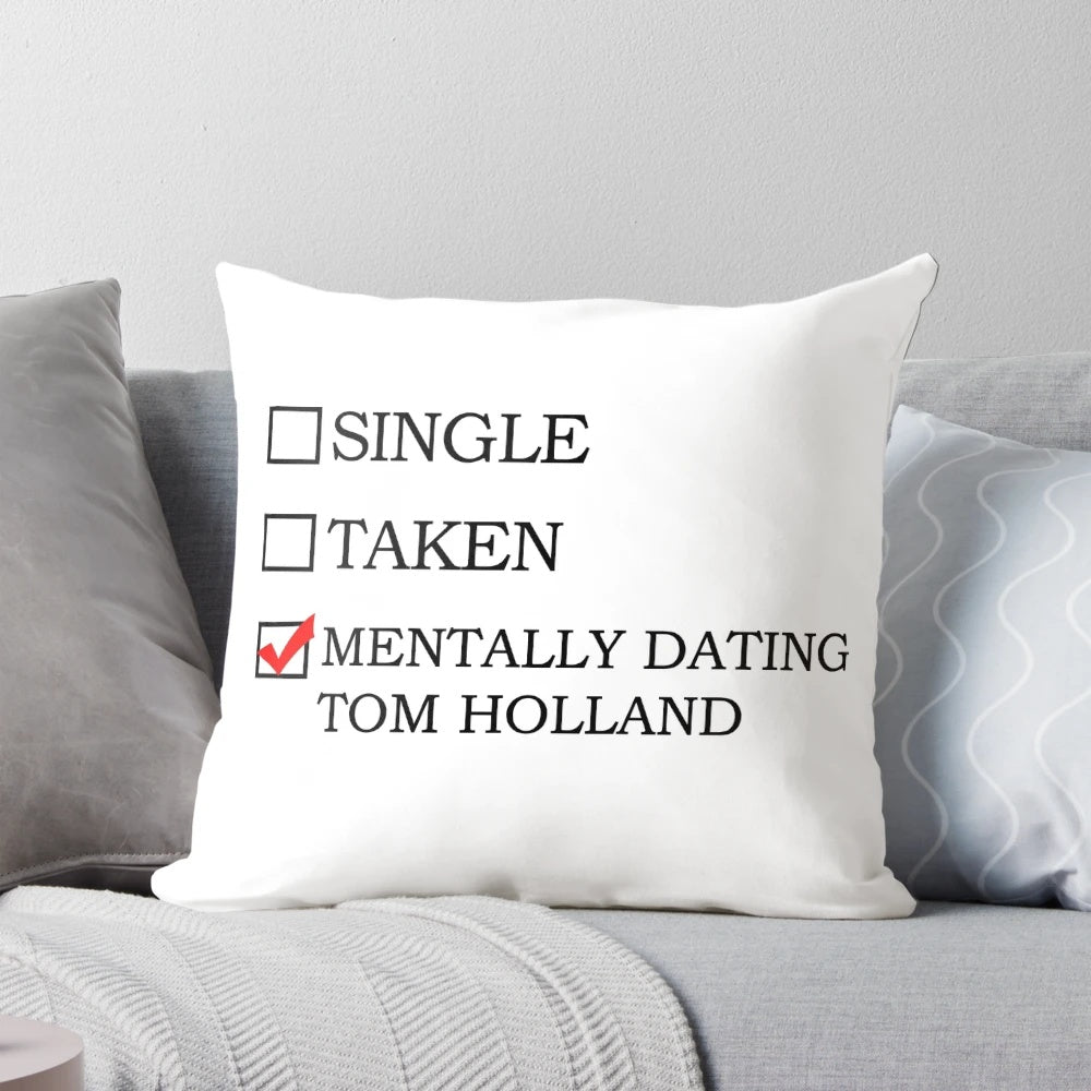 A plush pillow featuring an image of Tom Holland as Spider-Man, perfect for fans of the mentally dating trend.