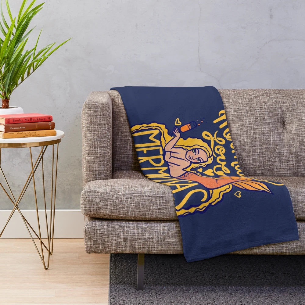 Mermaid-themed plush blanket with mermaids and mimosas