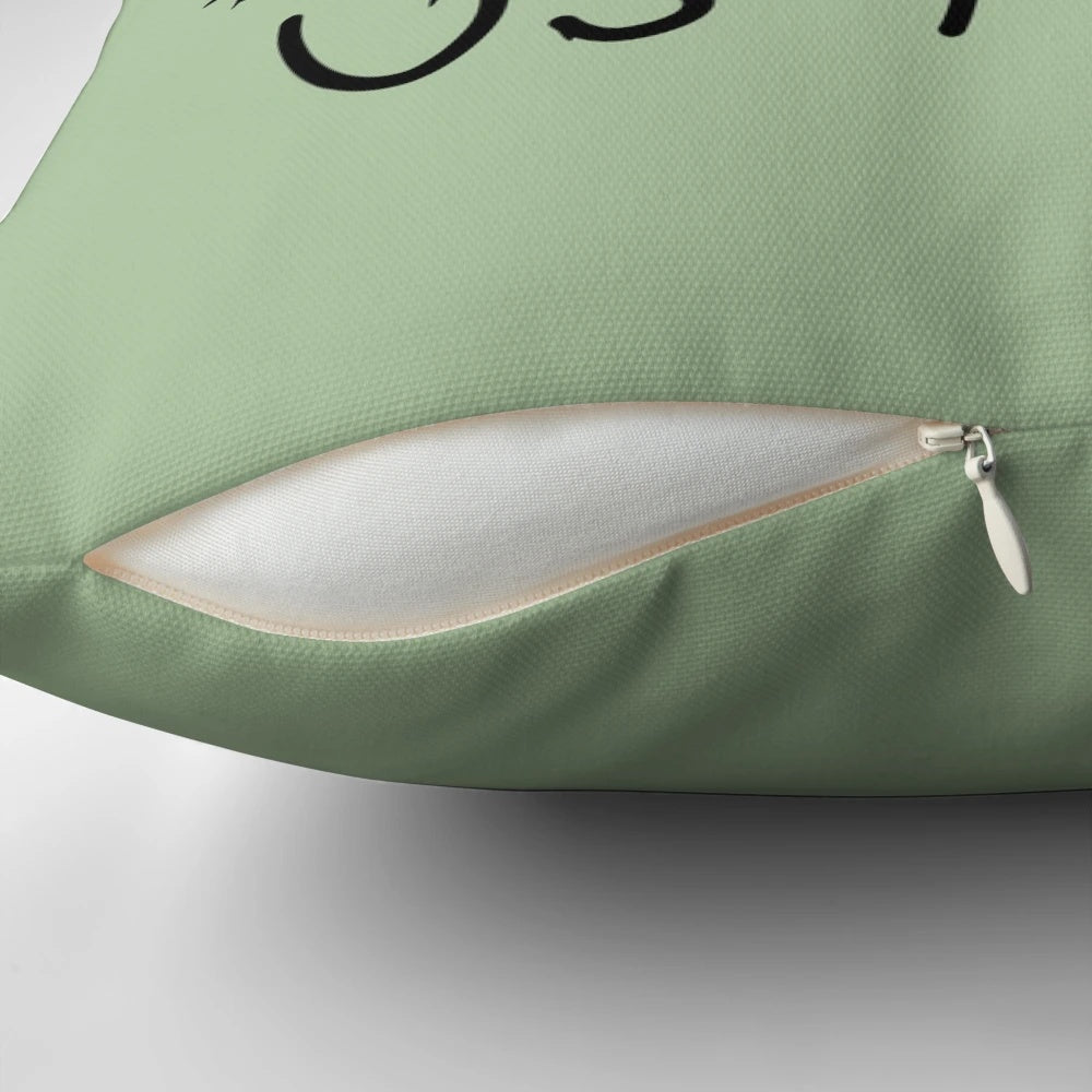 A cozy Christmas pillow with a Muppet mouse design