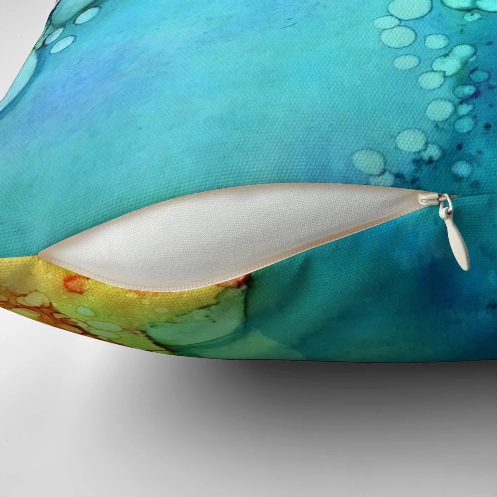 Vibrant and fluid abstract art design featuring colorful bubbles and dynamic movement on a plush pillow