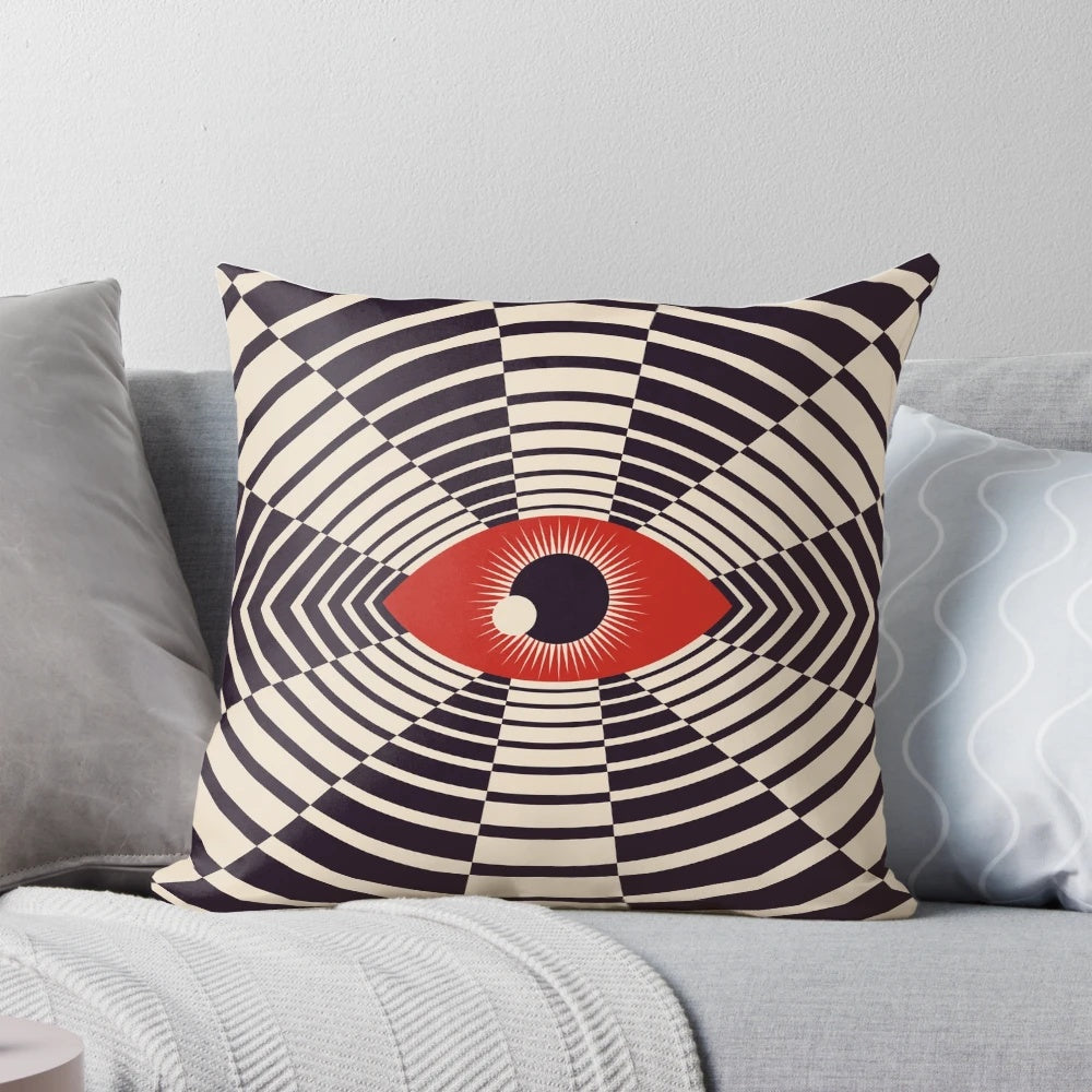 Minimalist all seeing eye pillow with a bold, graphic design