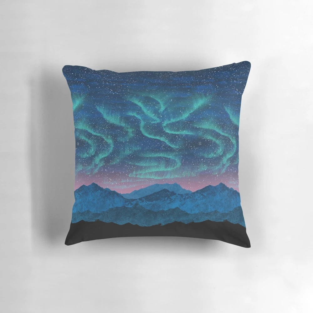 Stunning aurora borealis over a mountain landscape on a soft, comfortable pillow