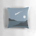 A cozy, minimal cat landscape pillow with a night sky, stars, and a meteor shower design.