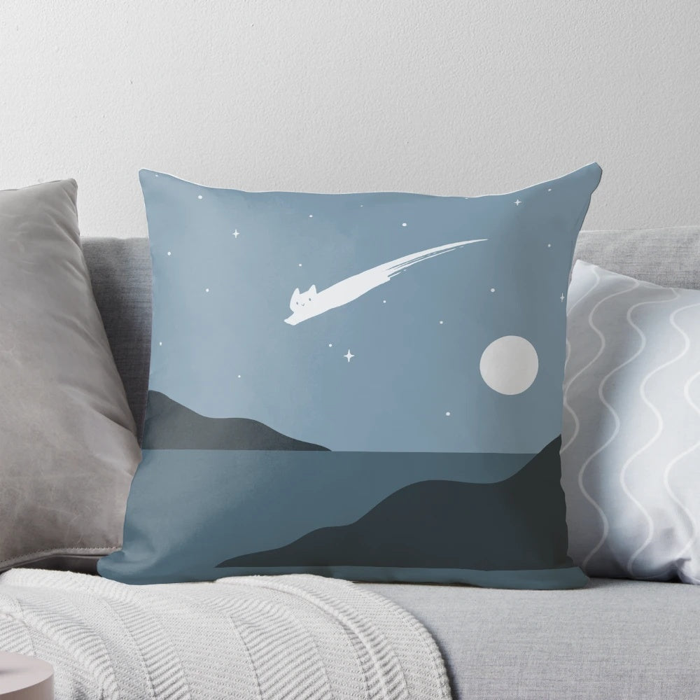 A cozy, minimal cat landscape pillow with a night sky, stars, and a meteor shower design.