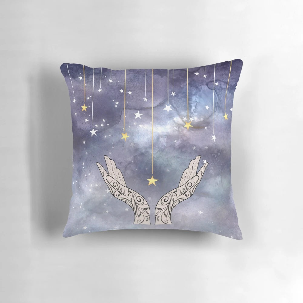 Decorative throw pillow featuring a watercolor design of falling stars, inspired by the A Court of Thorns and Roses book series.