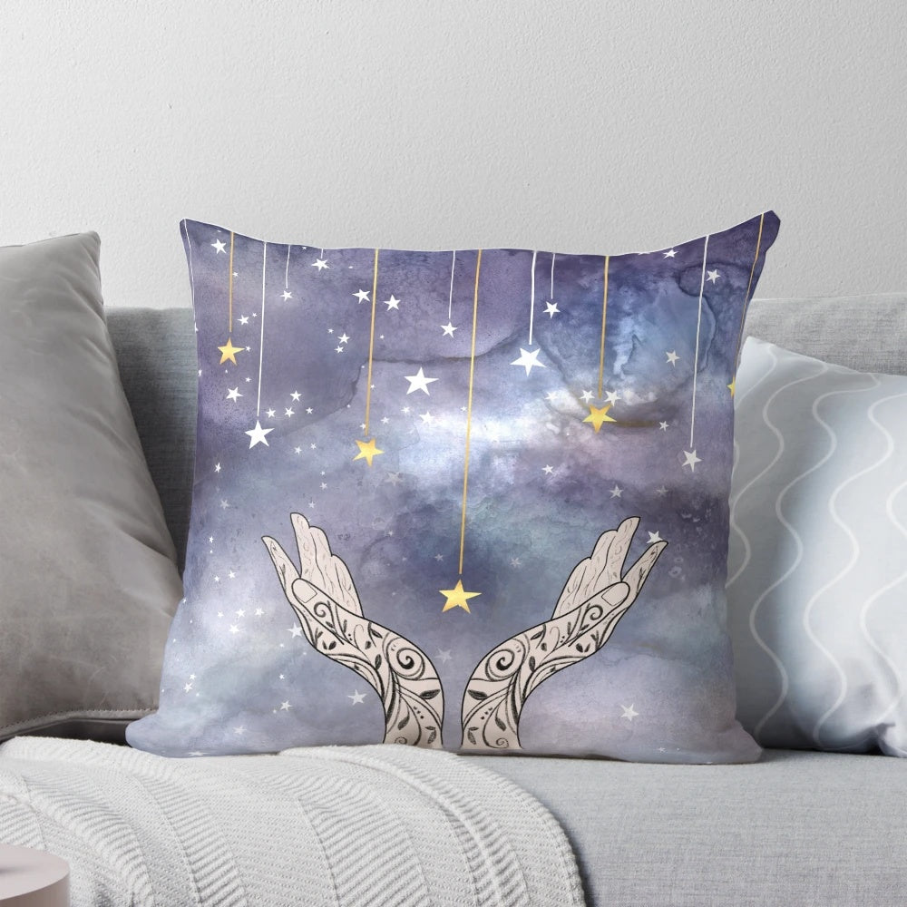 Decorative throw pillow featuring a watercolor design of falling stars, inspired by the A Court of Thorns and Roses book series.