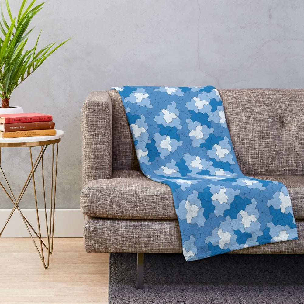 Geometric plush blanket with aperiodic Einstein tile patterns in shades of blue