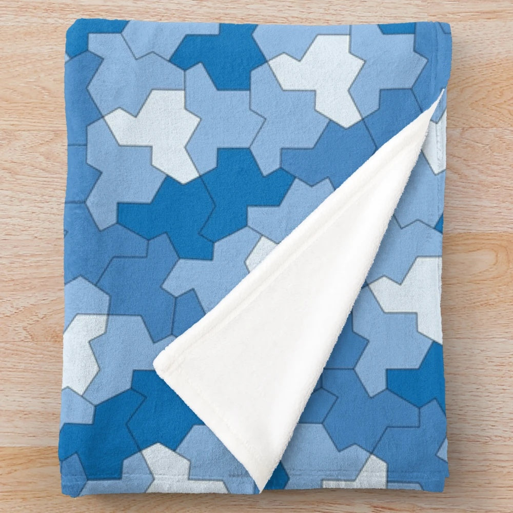 Geometric plush blanket with aperiodic Einstein tile patterns in shades of blue
