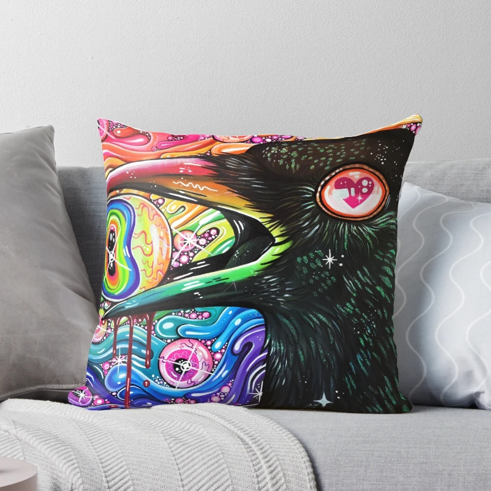 A decorative throw pillow featuring a vibrant, psychedelic image of a crow with glittering feathers and intense eyes.