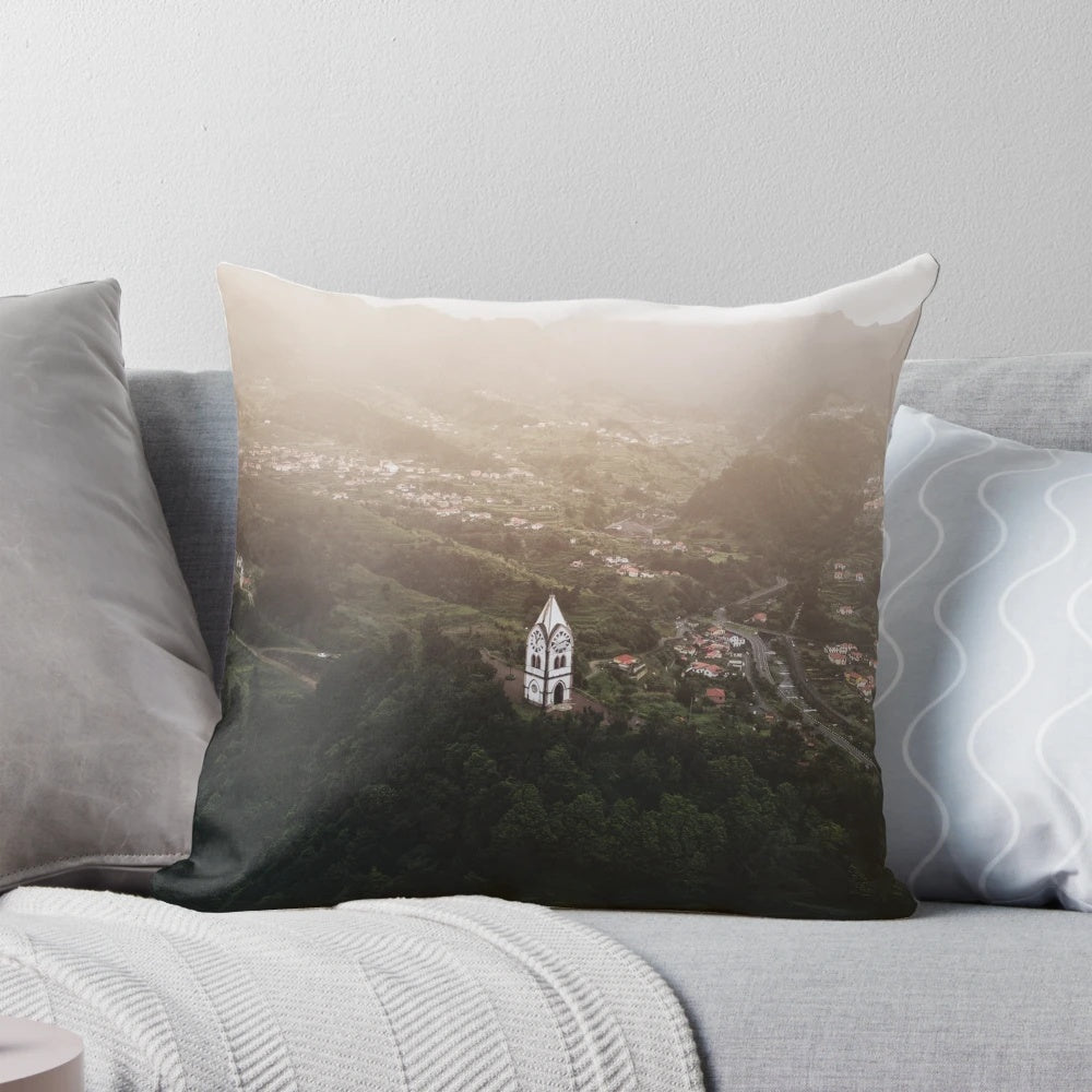 Pillow featuring a captivating drone view of a serene Madeira sunset with deep green, cinematic tones.