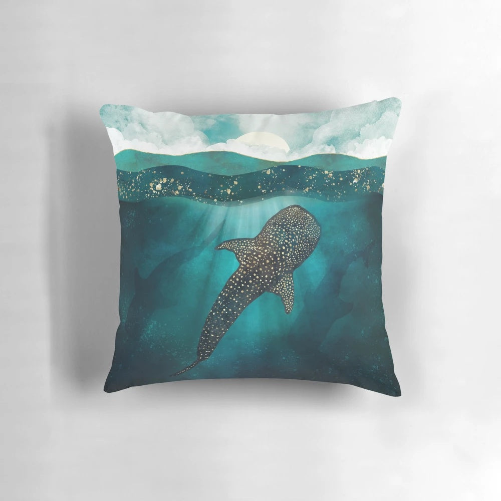 Metallic gold pillow featuring a detailed whale shark design in an abstract, contemporary style