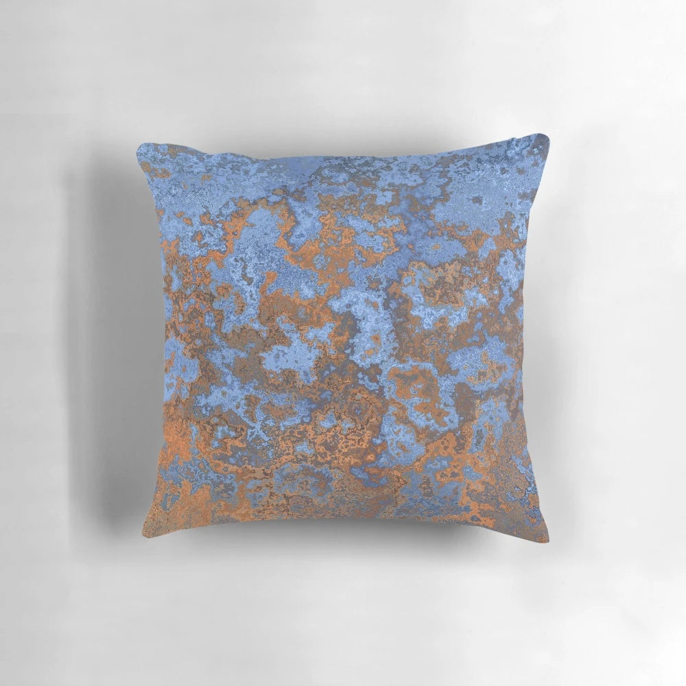 Vibrant "Earth and Sea II" modern abstract art pillow with textured, generative patterns in shades of blue and rust.