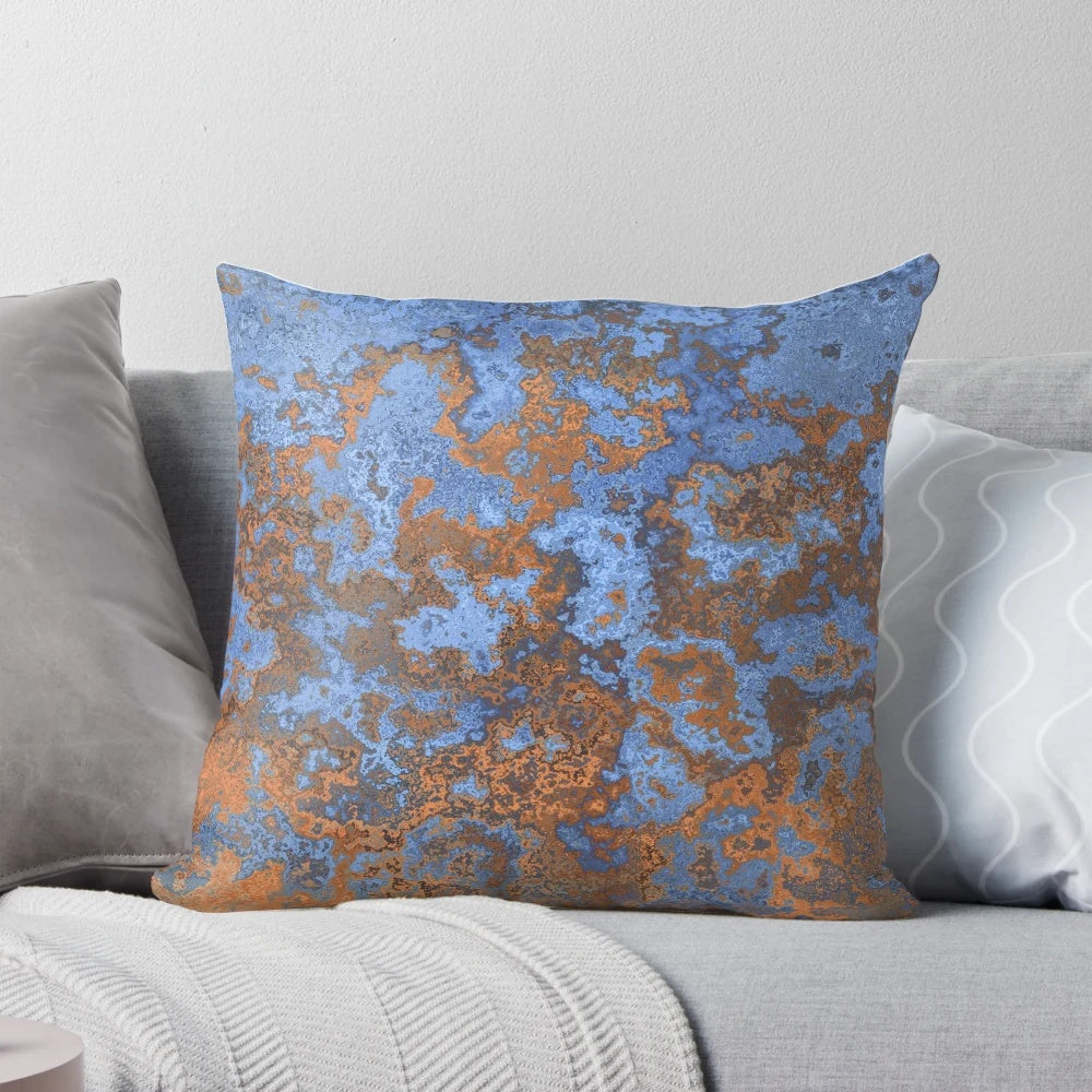 Vibrant "Earth and Sea II" modern abstract art pillow with textured, generative patterns in shades of blue and rust.