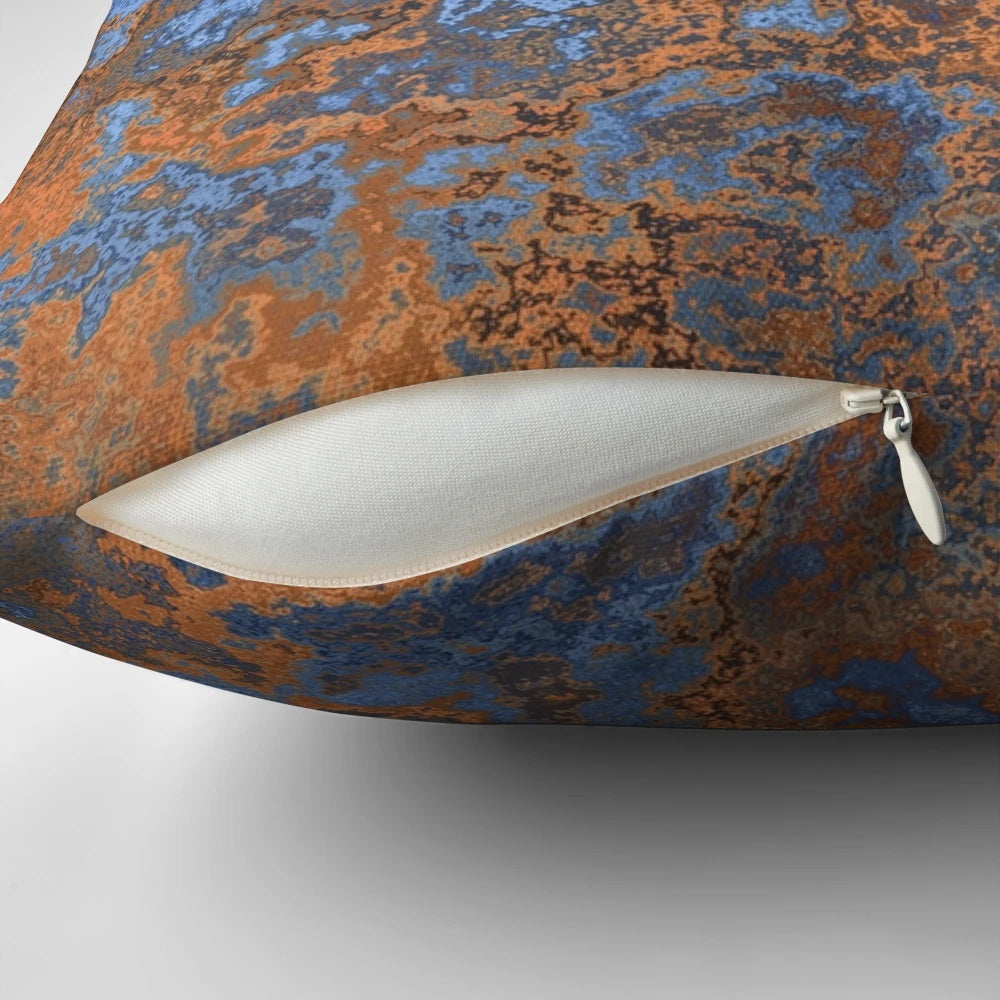 Vibrant "Earth and Sea II" modern abstract art pillow with textured, generative patterns in shades of blue and rust.