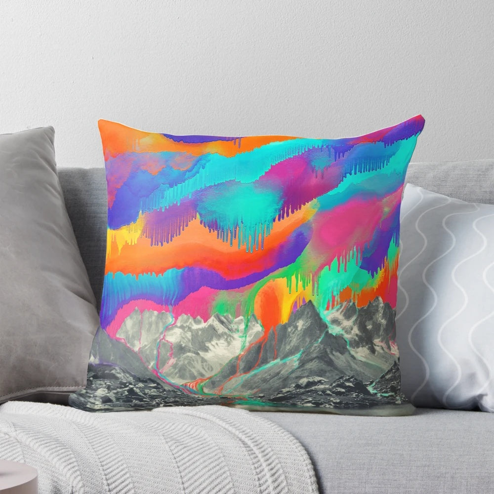 A Pillow featuring a breathtaking landscape scene with the Aurora Borealis, mountains, and snow.