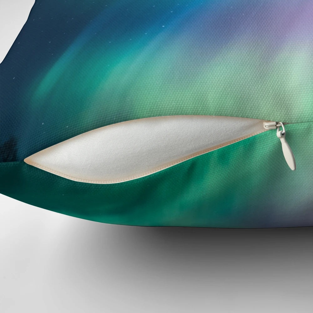 Vibrant northern lights or aurora borealis design on a soft, comfortable pillow.