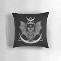 Black and white geometric bat pillow with moon and moth design
