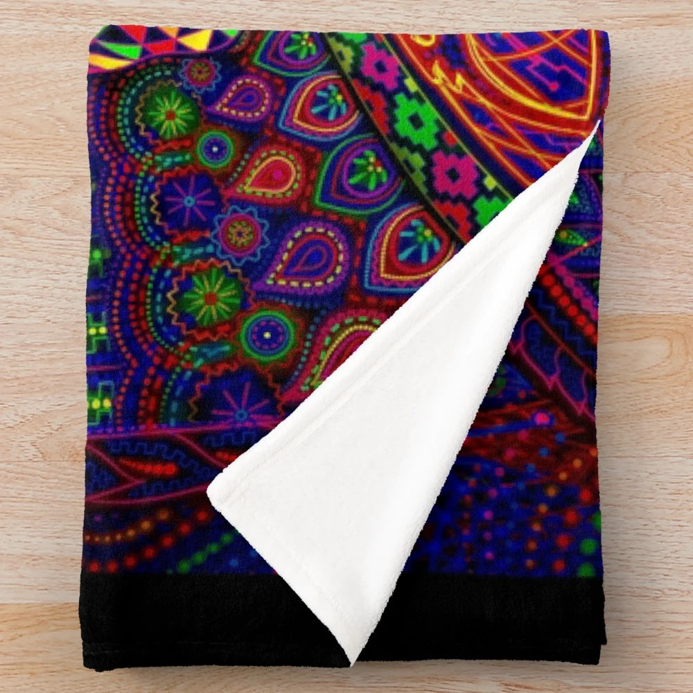 Psychedelic plush blanket with trippy, spiritual design