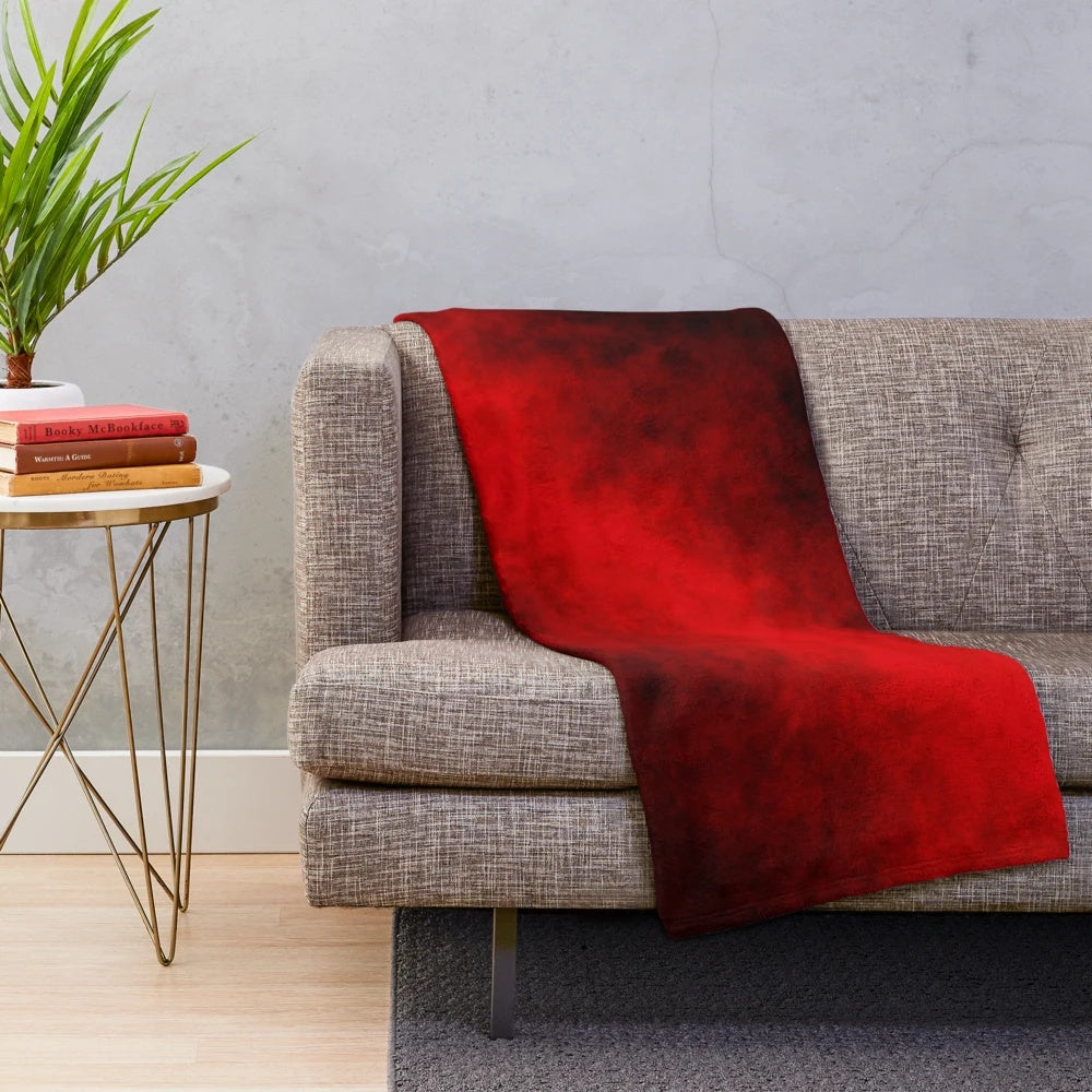 Red smoke patterned plush blanket with abstract design