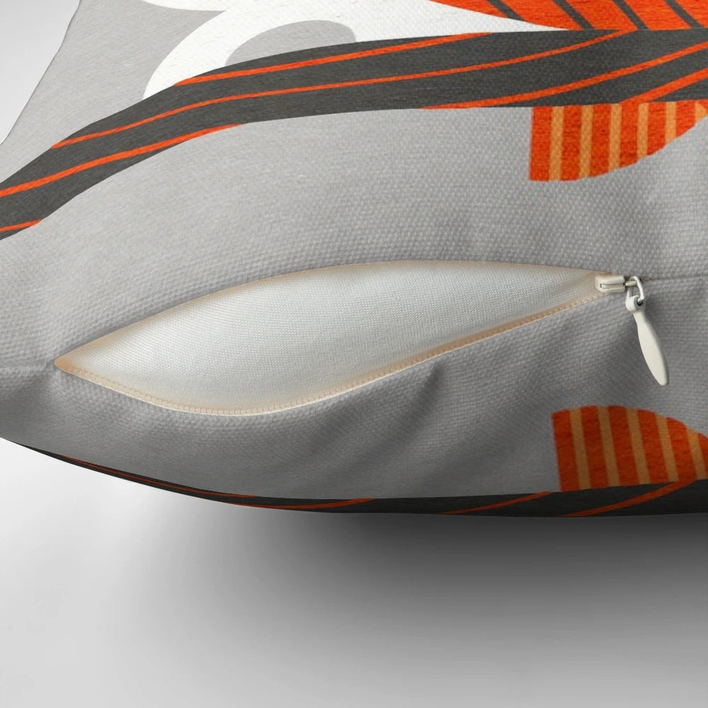 Screech owl digital illustration in a geometric, minimalist design on a decorative pillow.