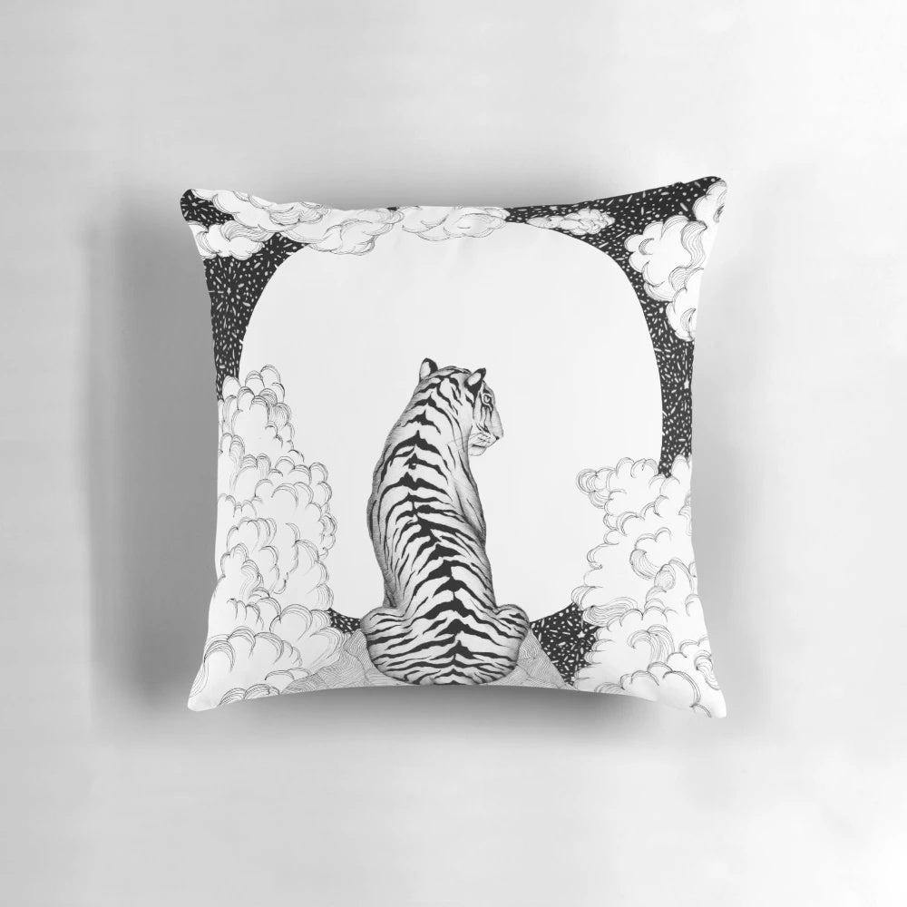 A stunning black and white illustration of a tiger silhouetted against a full moon and starry night sky, printed on a plush pillow.