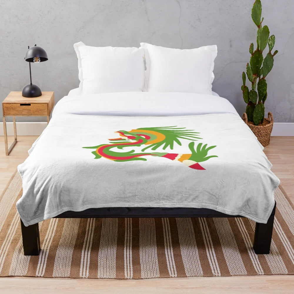 Quetzalcoatl, the feathered serpent deity, featured on a cozy plush blanket inspired by ancient Mesoamerican mythology.
