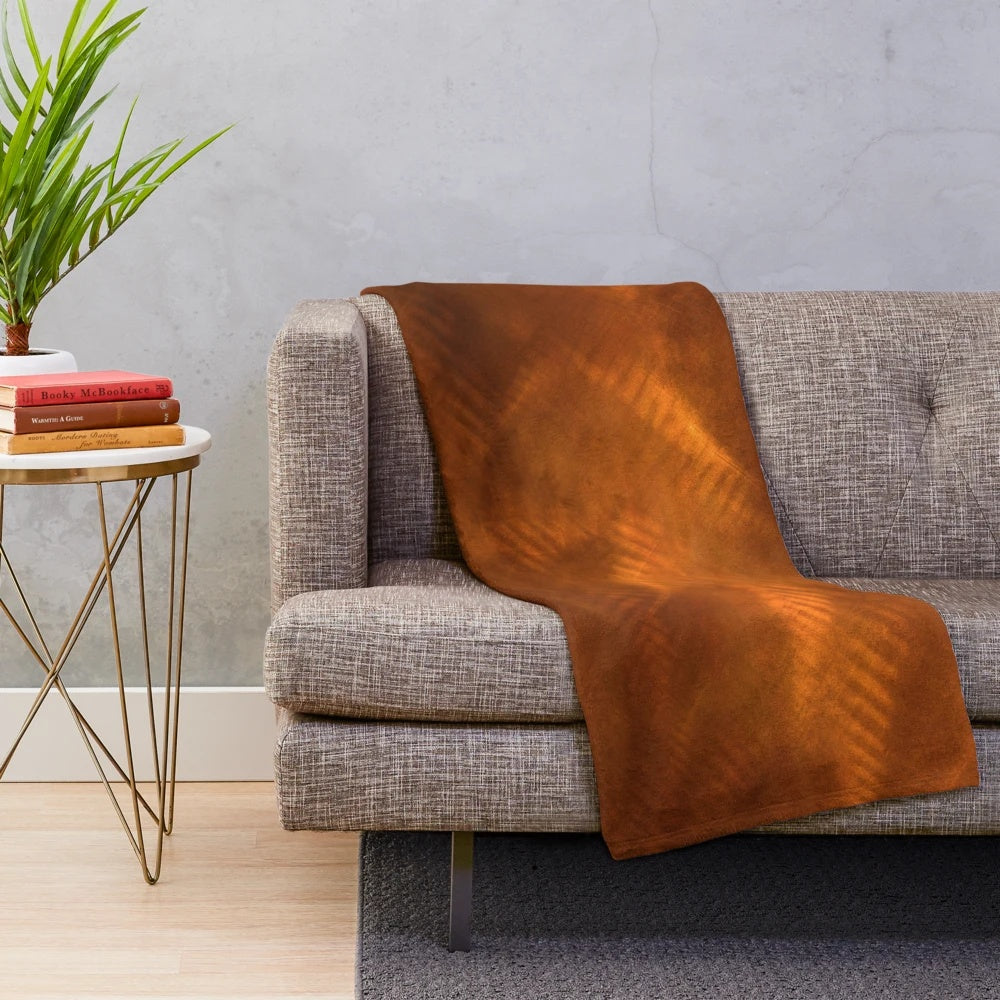 Orange copper plush blanket with metallic sheen