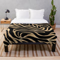 Metallic gold zebra print plush blanket with abstract art design
