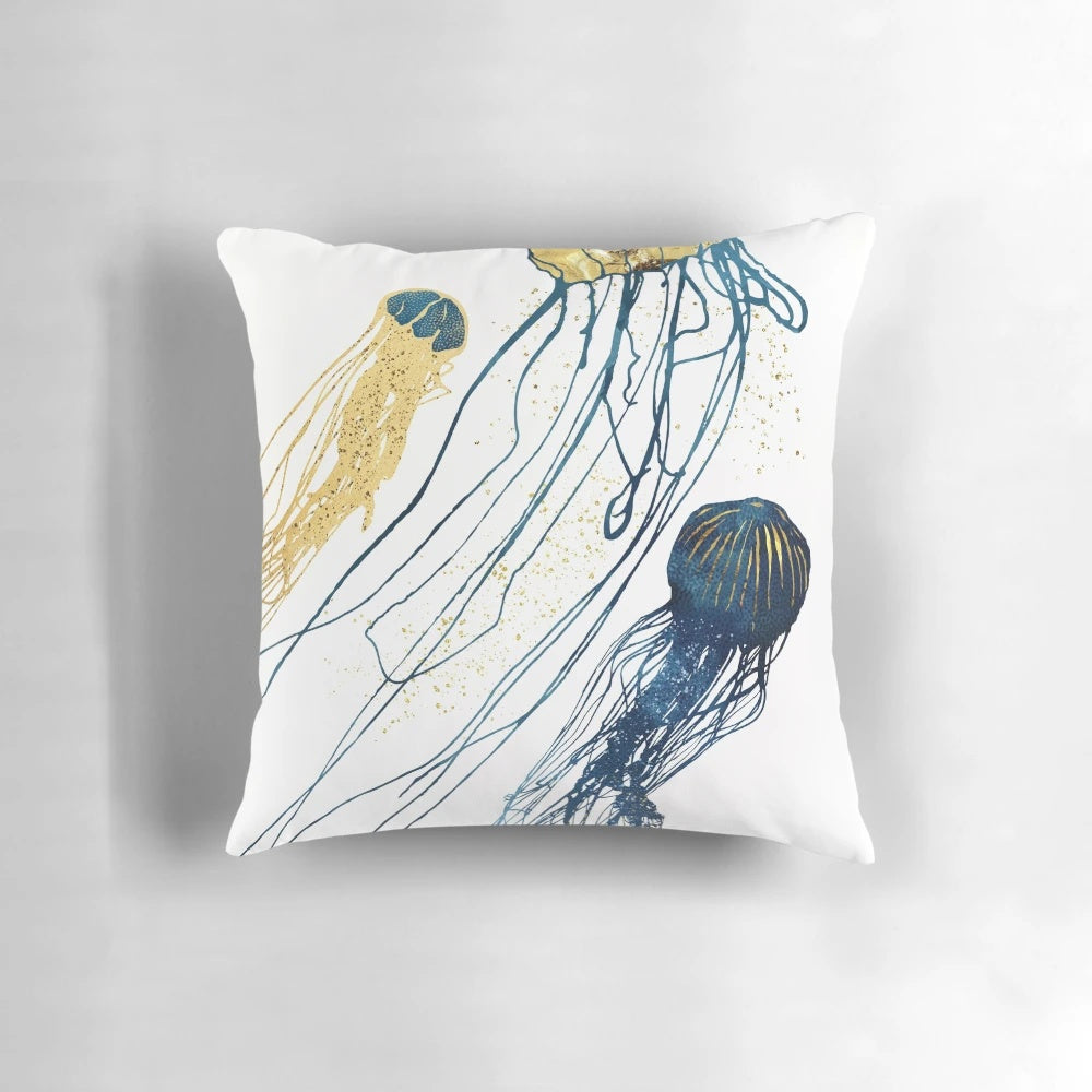 Metallic jellyfish-inspired decorative pillow with gold, bronze, and blue tones