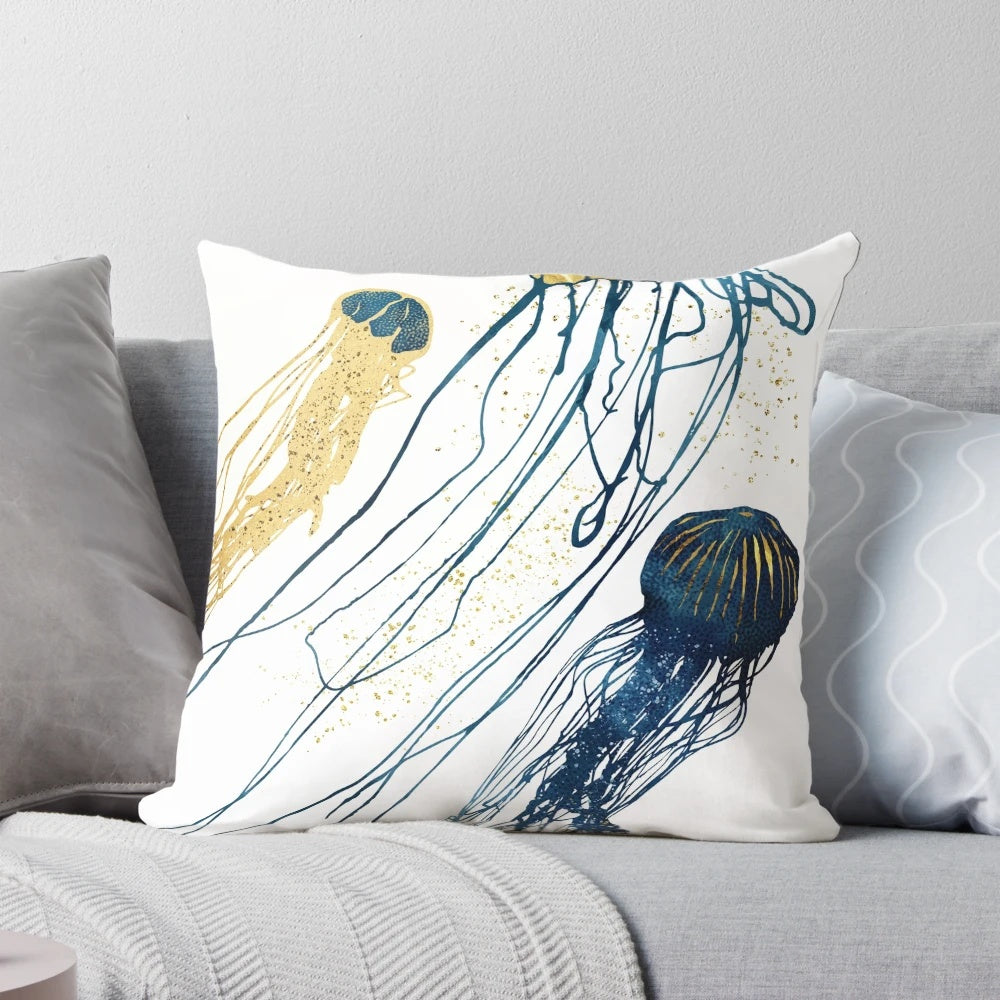 Metallic jellyfish-inspired decorative pillow with gold, bronze, and blue tones