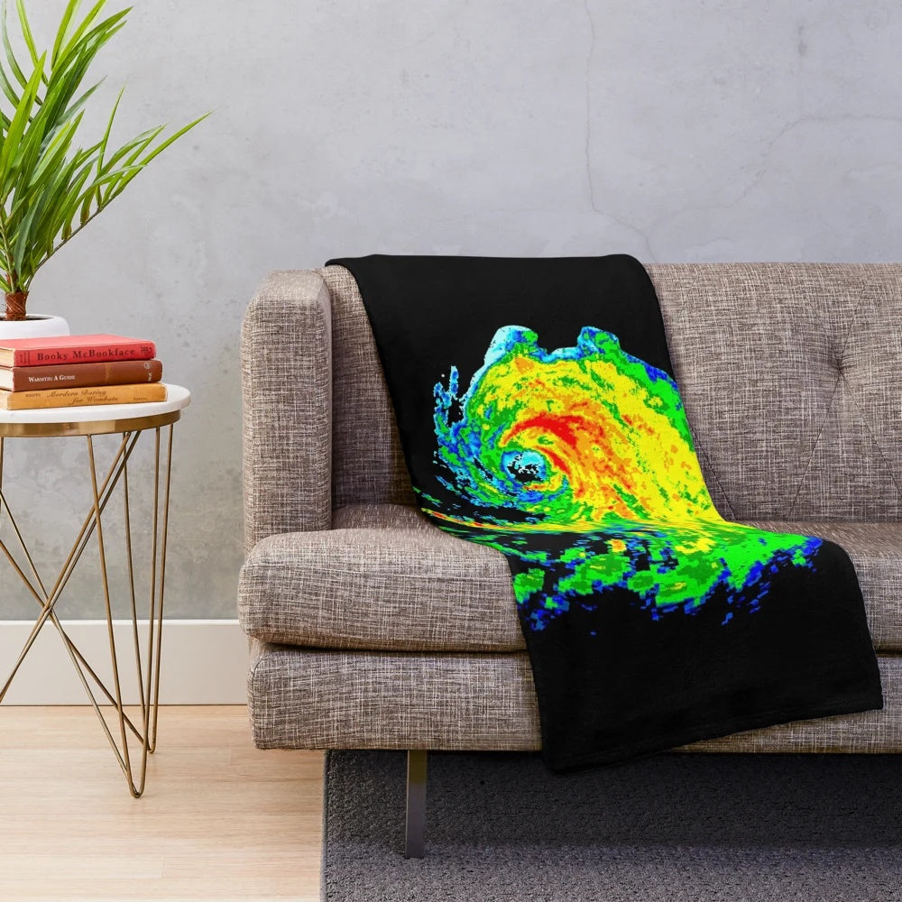 Plush blanket featuring weather radar imagery and meteorology-related graphics