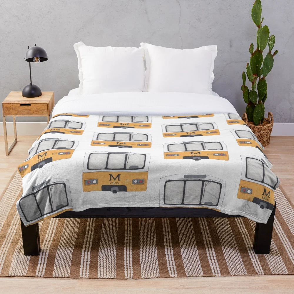 Metro-inspired plush blanket featuring a stylish and comfortable design