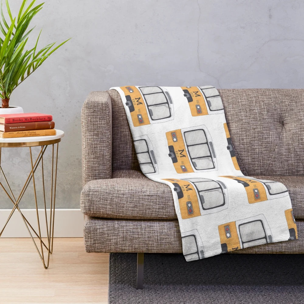Metro-inspired plush blanket featuring a stylish and comfortable design