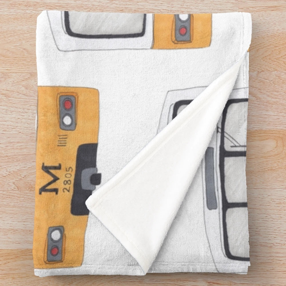 Metro-inspired plush blanket featuring a stylish and comfortable design