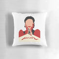 A decorative pillow featuring a close-up image of Mia Goth's character "Pearl" from the horror movie, with a bloody smile.