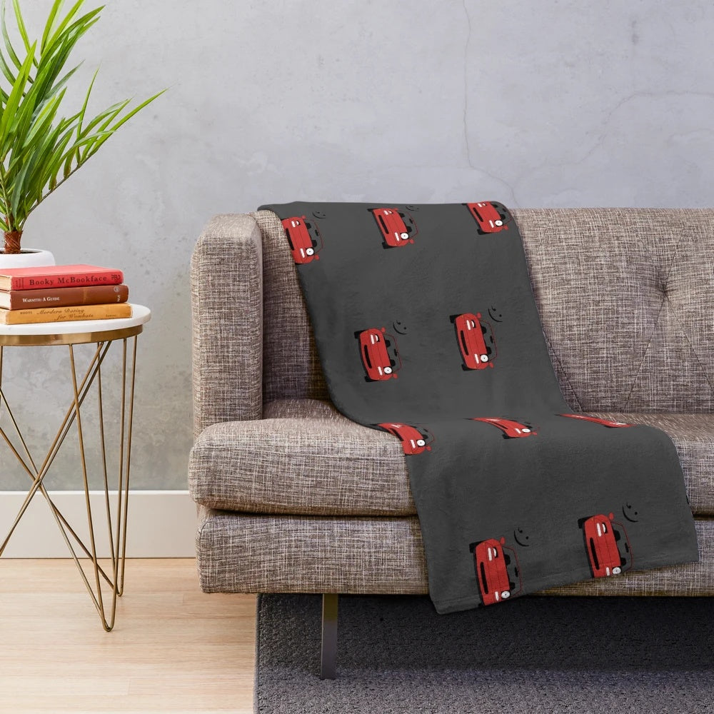 Miata inspired plush blanket with automotive design