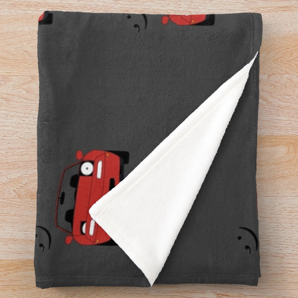Miata inspired plush blanket with automotive design