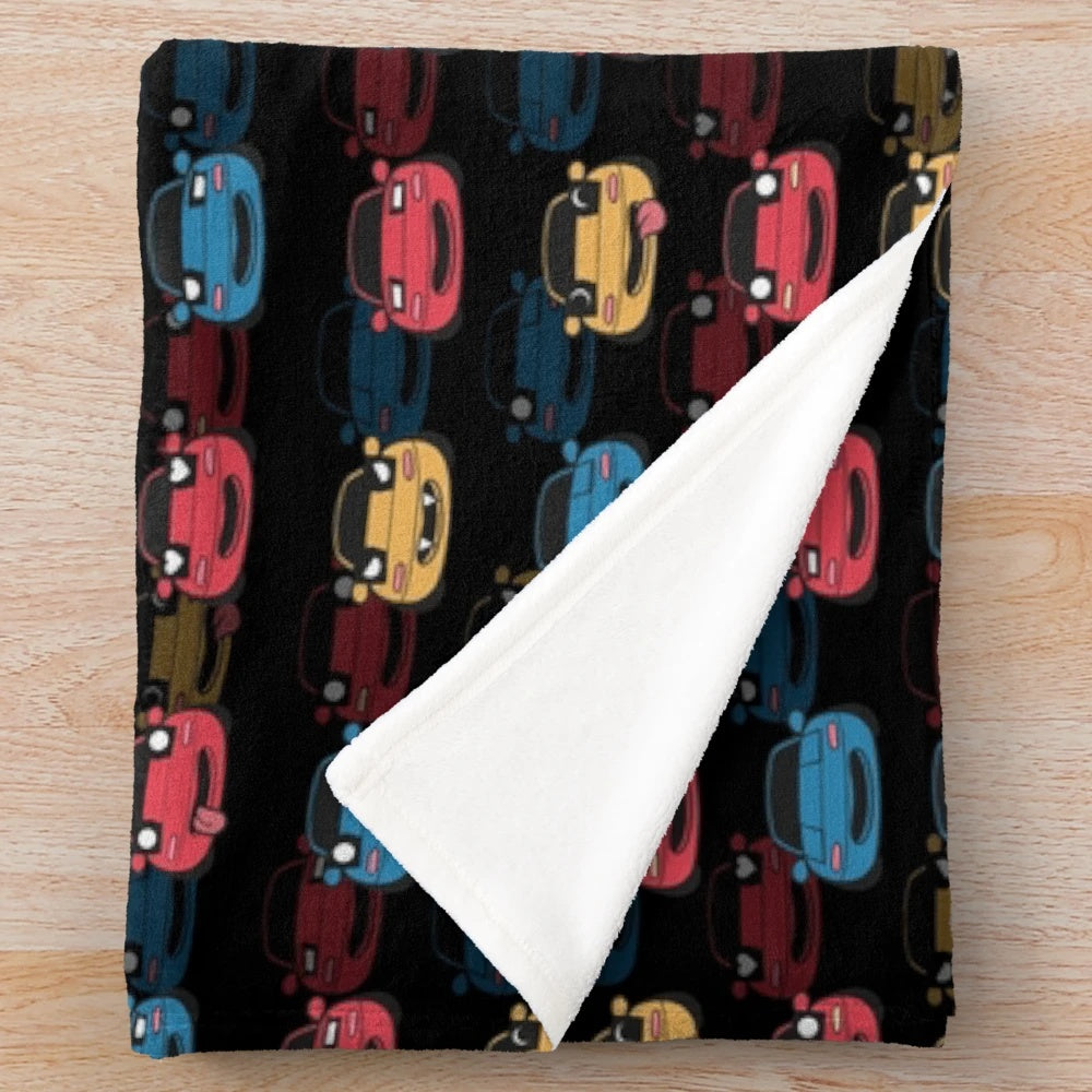 Miata-inspired plush blanket featuring a black and white pattern design