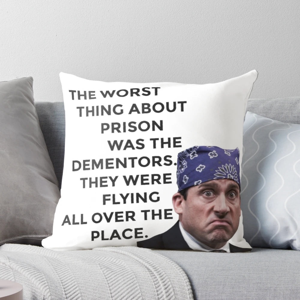 A decorative throw pillow featuring the character Prison Mike from the TV show The Office, played by actor Steve Carell.