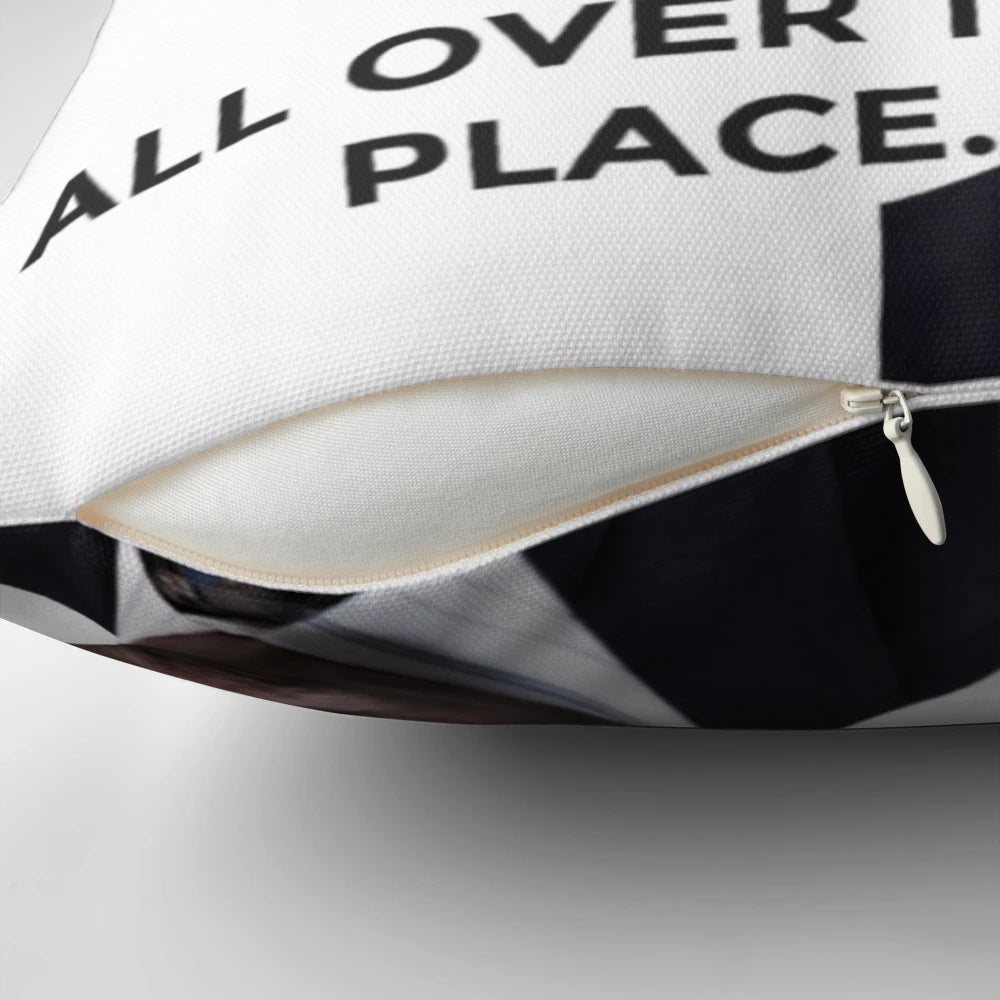 A decorative throw pillow featuring the character Prison Mike from the TV show The Office, played by actor Steve Carell.