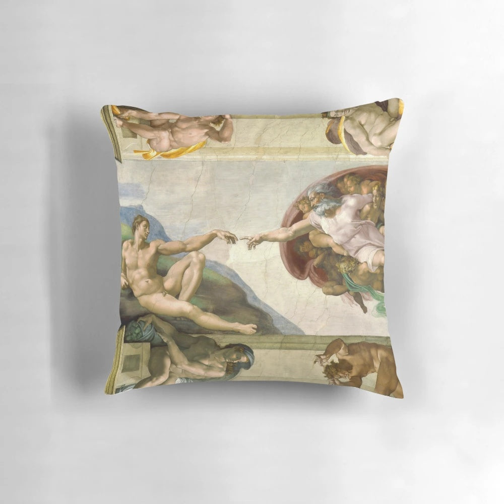 Michelangelo's masterpiece "The Creation of Adam" depicted on a high-quality decorative pillow for your home.