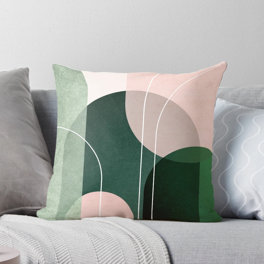 A mid century modern throw pillow featuring a curved archway design in soft pink and green tones.