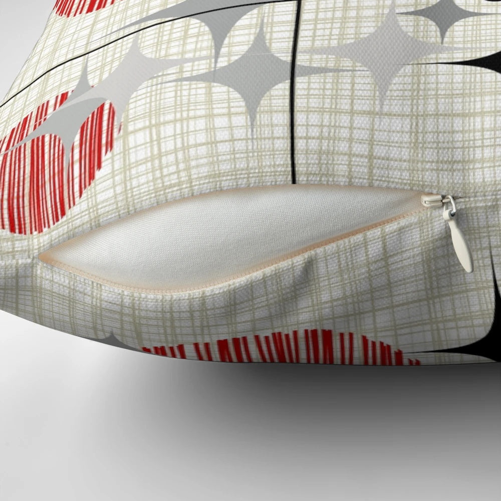 Eames era starburst and globe pattern pillow in a retro atomic inspired design