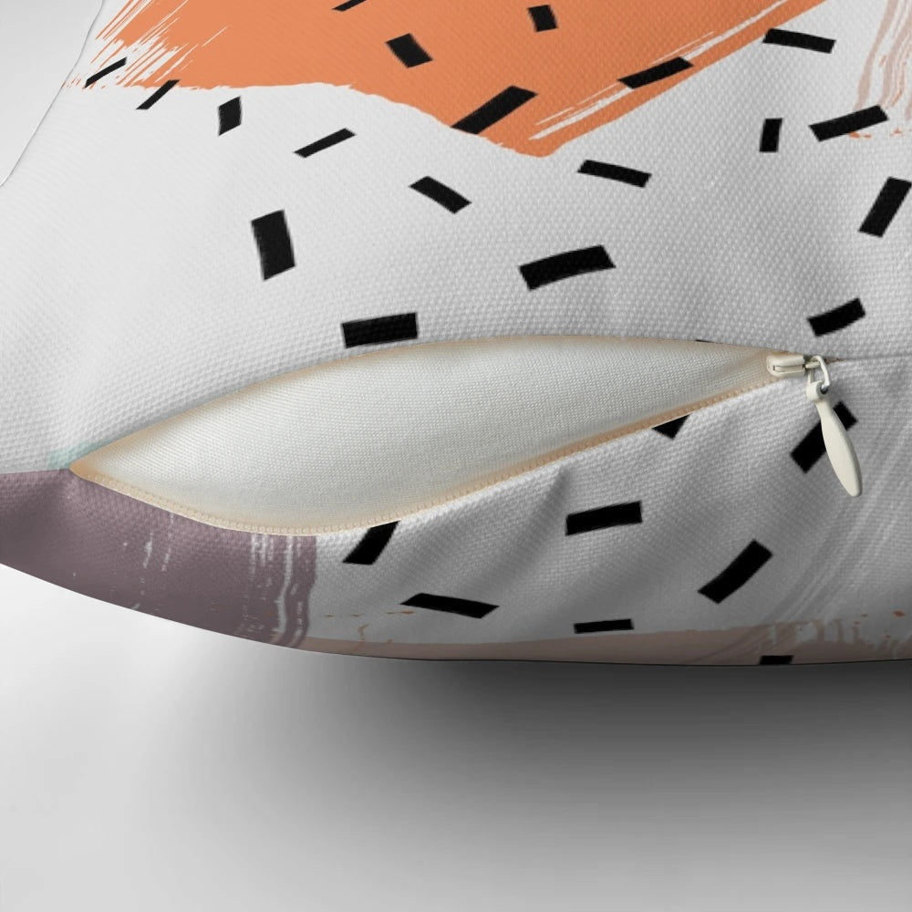 A vibrant abstract pattern pillow with geometric shapes, dots, and dashes in a mid-century modern style.