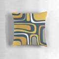 Mid-century modern abstract pattern in light and dark mustard, gray, and white on navy blue pillow